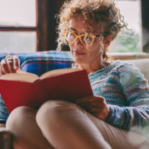 Woman At Home Sitting And Read
